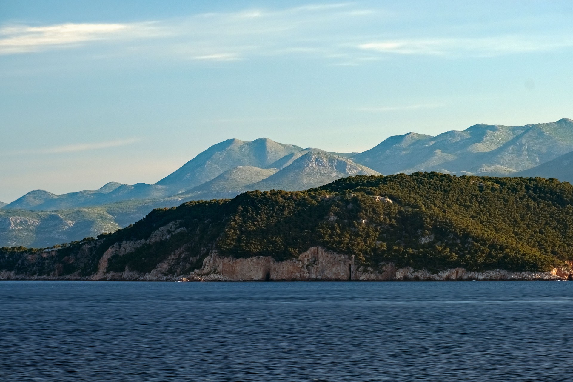 Sunrise Over Dubrovnik Islands And Distant Mountains